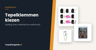 Set metalen tepelklemmen in een doos en twee losse modellen met ketting